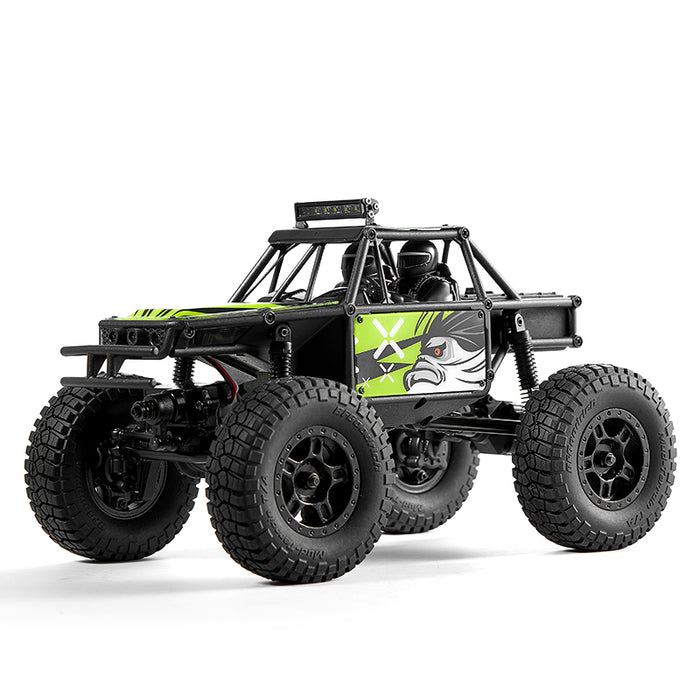 FMS 1:24 FCX24 Lemur RTR rock crawler with black and green design on white background.