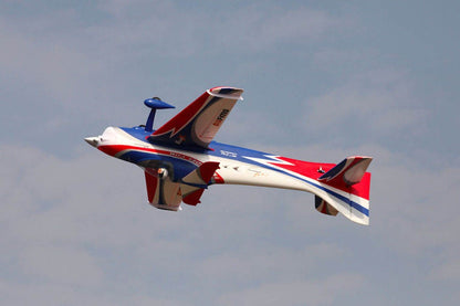 F3A Olympus RC airplane executing an aerial stunt against a cloudy sky.