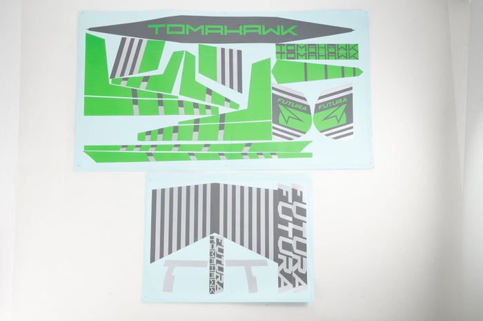RC model stickers with 'TOMAHawk' and 'Futura' designs in green and grey.
