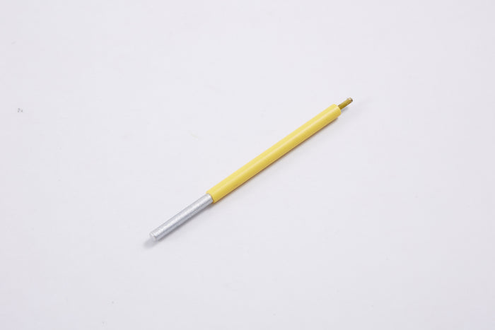 Yellow and silver pen on white background