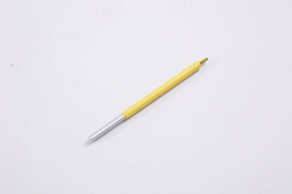 Yellow and silver pen on white background