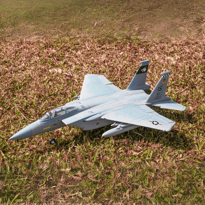 FMS 64mm EDF F-15 V2 PNP jet model on grass with realistic military design