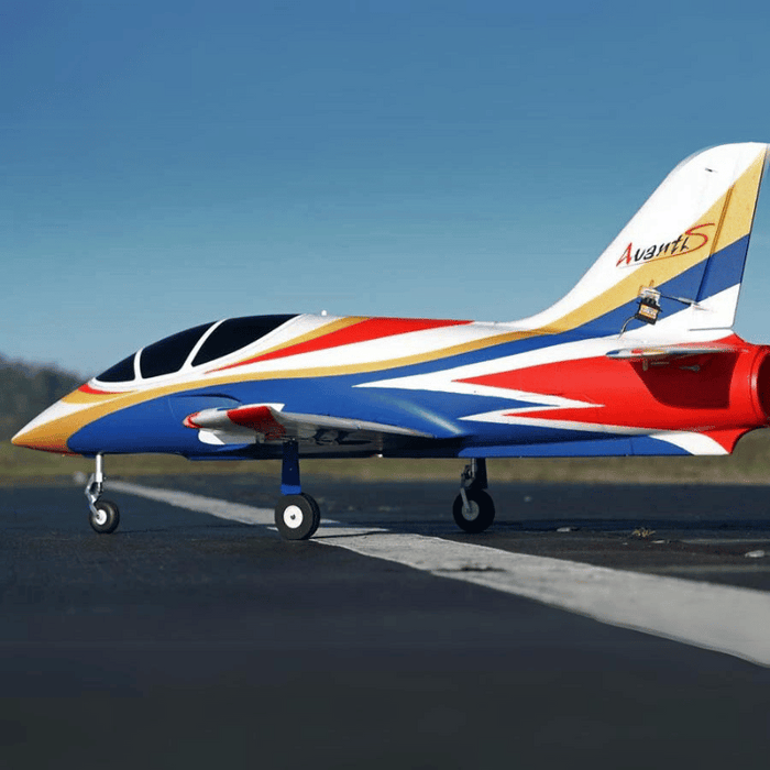 FMS Avanti V3 jet model with vibrant red, blue, and gold colors on the runway