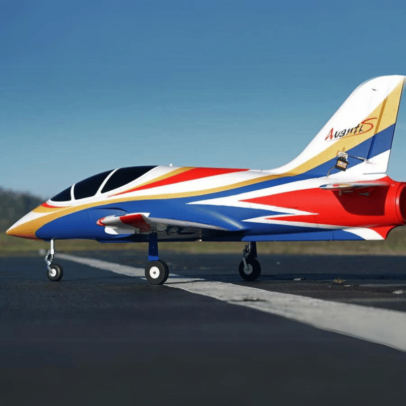 FMS Avanti V3 jet model with vibrant red, blue, and gold colors on the runway