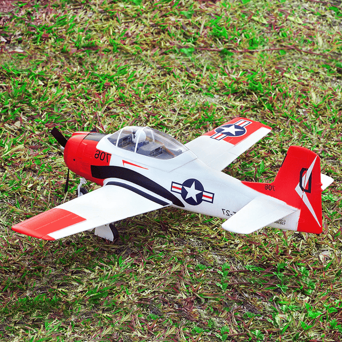 FMS 800mm T-28 Trojan V2 PNP Red RC airplane on grass