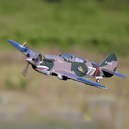 FMS P-40B Flying Tiger RC plane flying with distinctive shark-mouth design