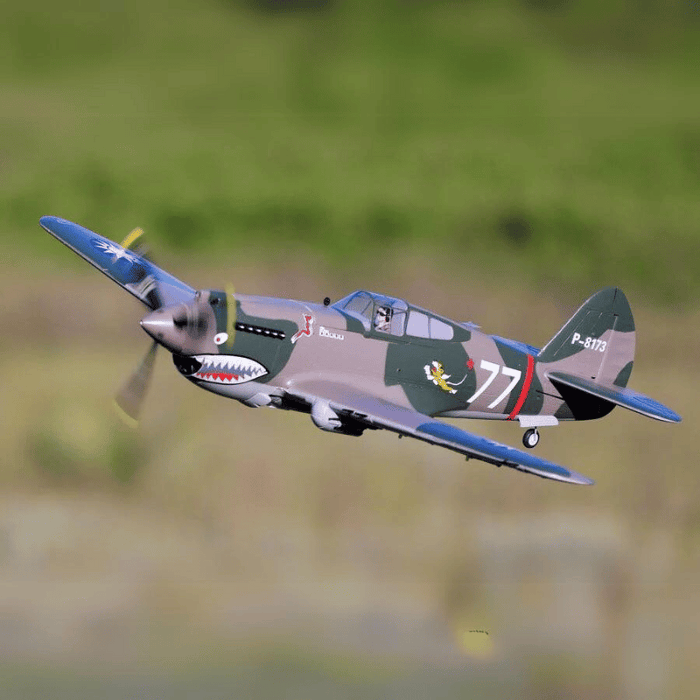 FMS P-40B Flying Tiger RC plane flying with distinctive shark-mouth design