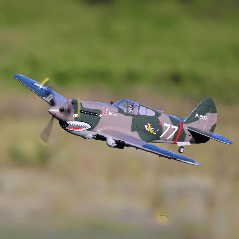 FMS P-40B Flying Tiger RC plane flying with distinctive shark-mouth design